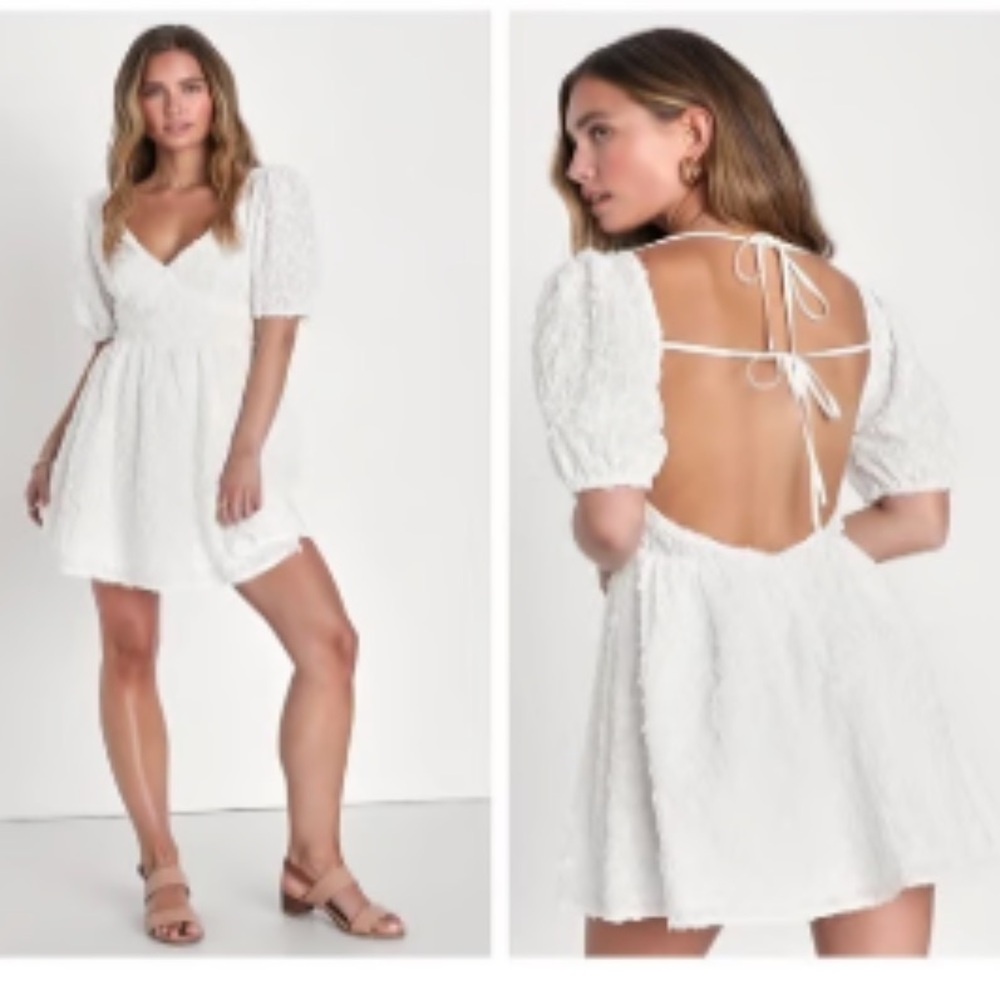 NWT lulus white lace floral dress. Zipper and two ties in the back. Size large.
